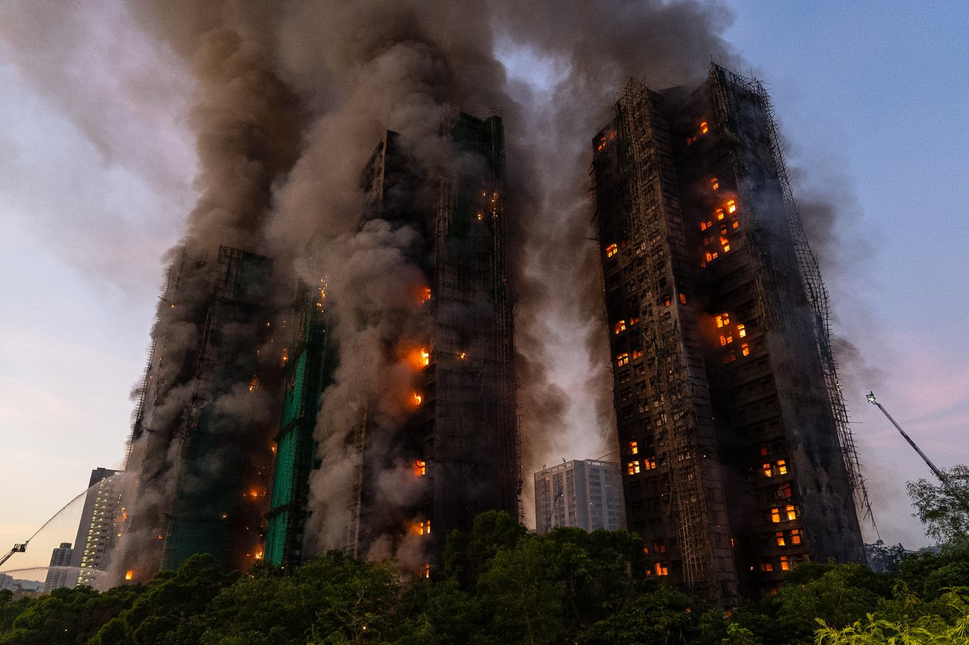Hong Kong charges 7 people and 2 firms over massive fire that killed 168 | iNhome Hong Kong charges 7 people and 2 firms over massive fire that killed 168 | iNhome
