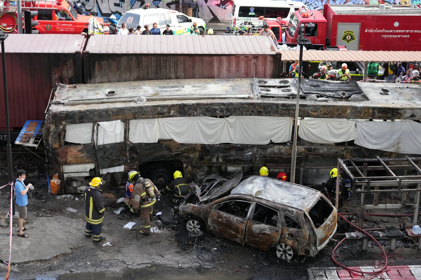 A cargo train hits a public bus at a Bangkok rail crossing, killing at least 8 | iNwheels A cargo train hits a public bus at a Bangkok rail crossing, killing at least 8 | iNwheels