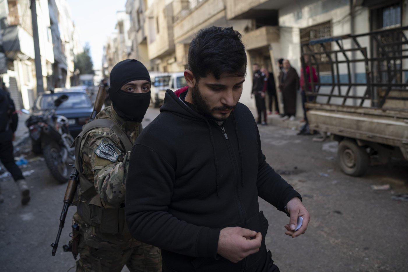 AP PHOTOS: Syria's new security forces conduct sweeps in Homs, looking for ousted Assad's loyalists | iNFOnews.ca