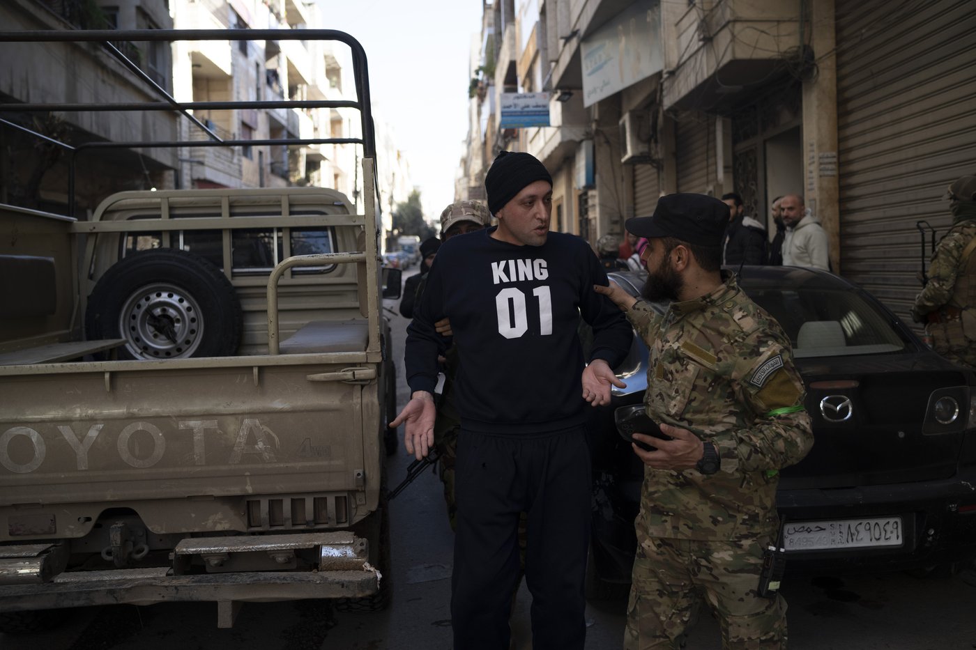 AP PHOTOS: Syria's new security forces conduct sweeps in Homs, looking for ousted Assad's loyalists | iNFOnews.ca