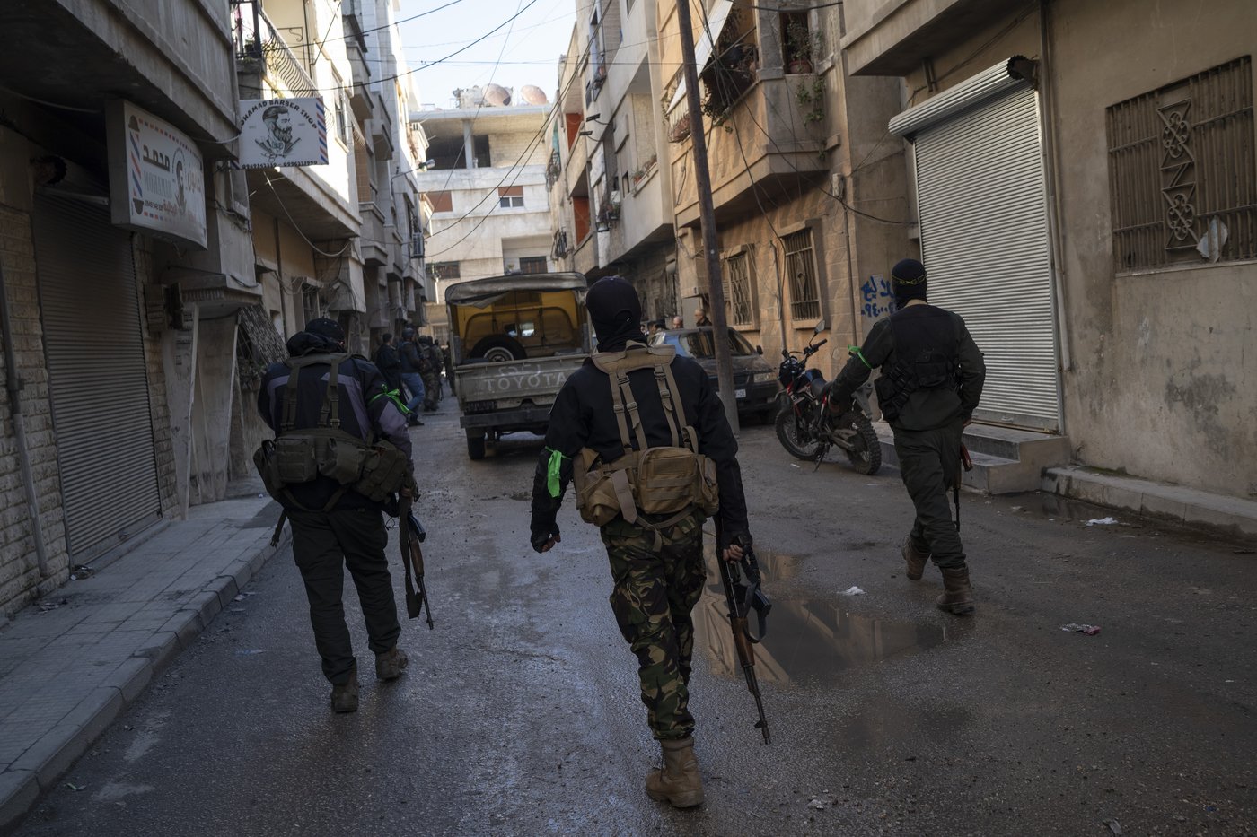 AP PHOTOS: Syria's new security forces conduct sweeps in Homs, looking for ousted Assad's loyalists | iNFOnews.ca
