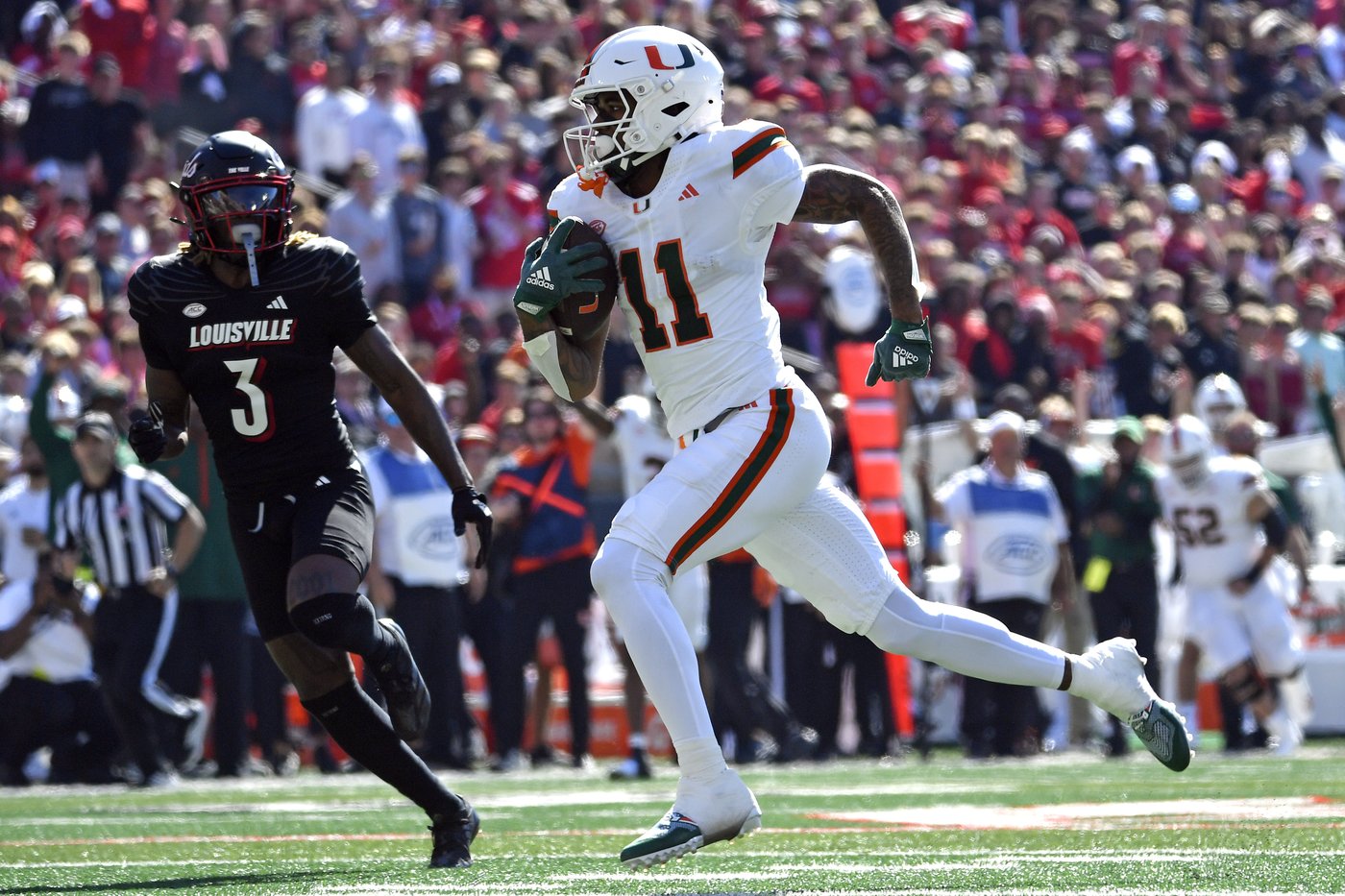 Cam Ward throws for 4 touchdowns, No. 6 Miami survives Louisville comeback bids for wild 52-45 win | iNFOnews.ca Cam Ward throws for 4 touchdowns, No. 6 Miami survives Louisville comeback bids for wild 52-45 win | iNFOnews.ca