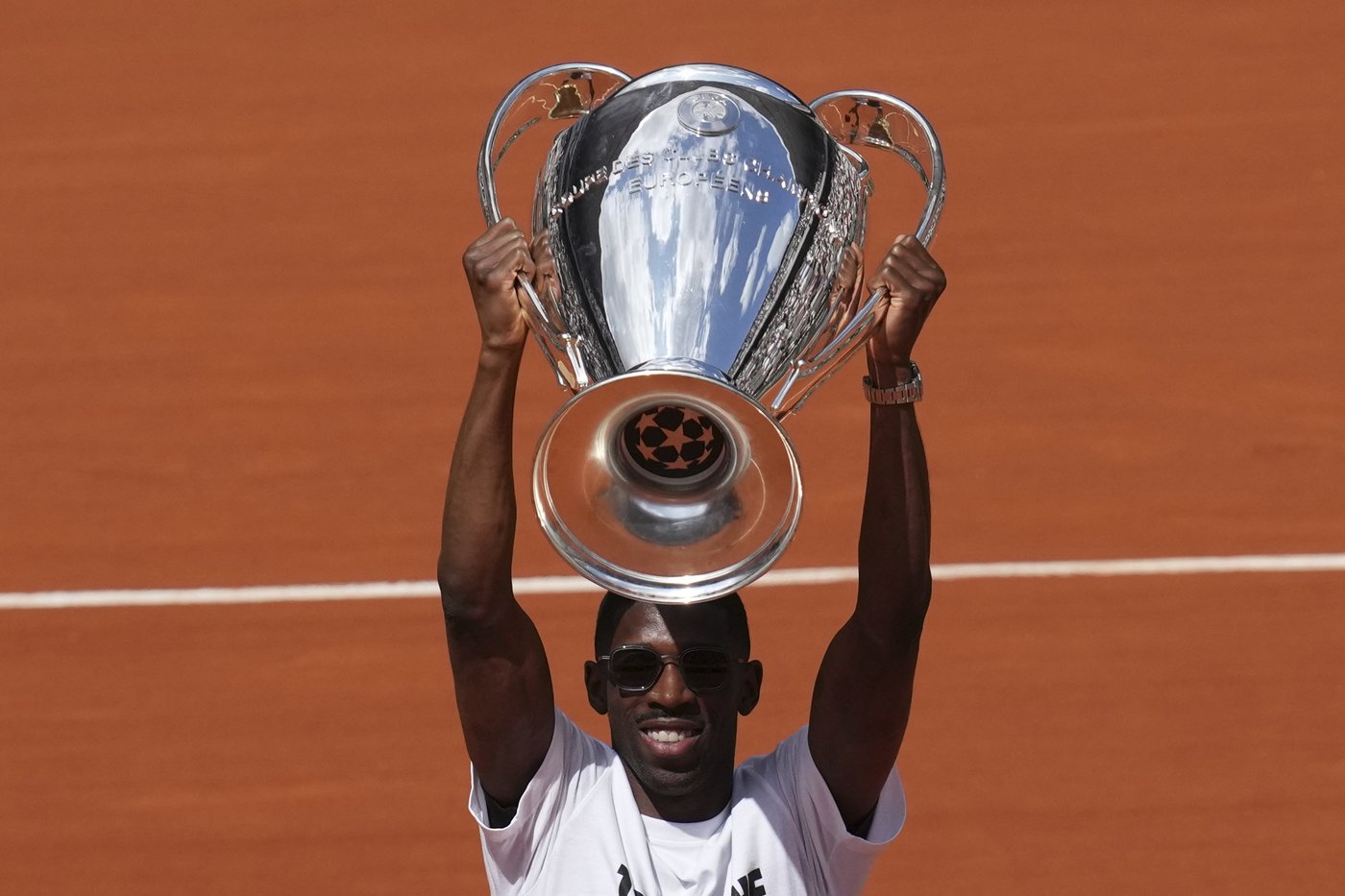 PSG star Dembélé raises Champions League trophy at the French Open | iNFOnews.ca