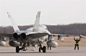 Canada faces new Cold War in Europe and hot war against ISIL in Iraq in 2015 | iNFOnews.ca CP31211823