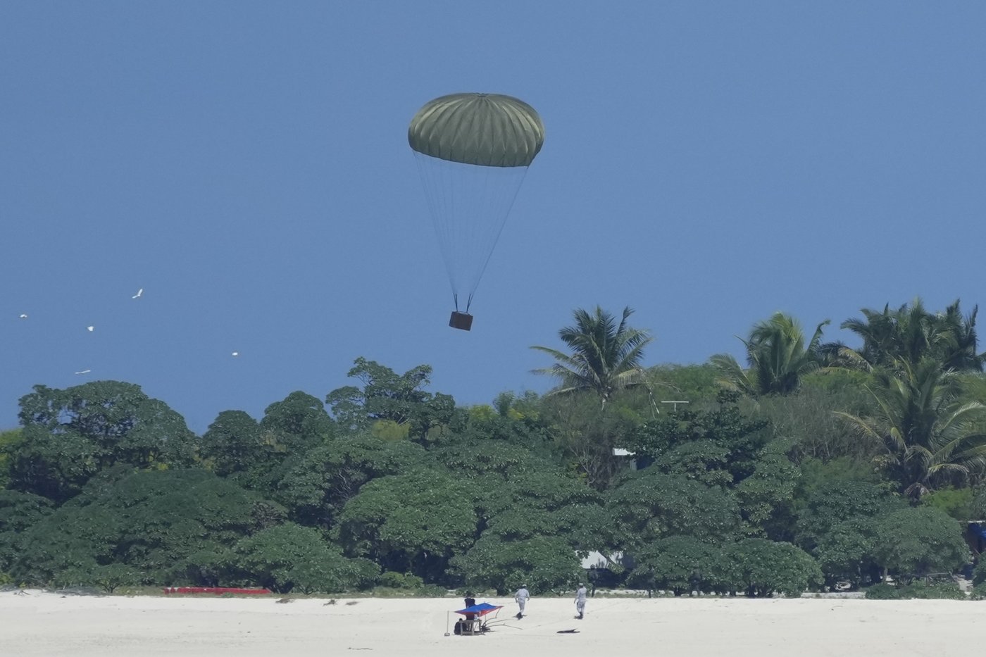 Philippine forces retake an island in mock combat as China's navy watches | iNFOnews.ca