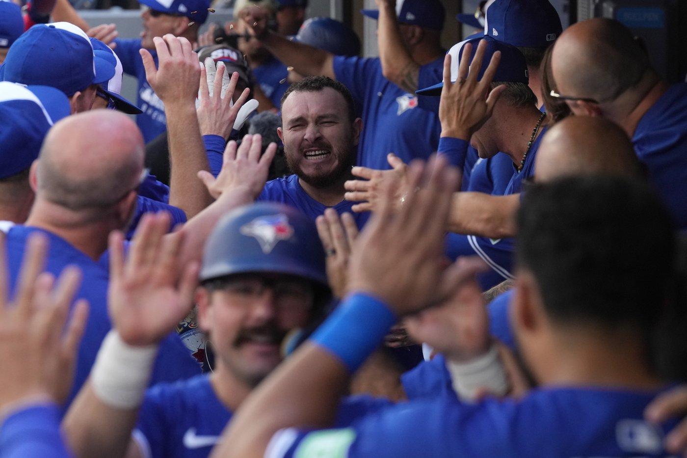Kirk drives in six runs as Jays wallop Rays 13-4 to win division and earn playoff bye | iNFOnews.ca