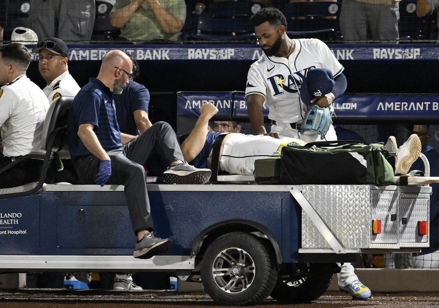 Rays pitcher carted off field and taken to hospital after foul ball into dugout hits him in face | iNFOnews.ca Rays pitcher carted off field and taken to hospital after foul ball into dugout hits him in face | iNFOnews.ca