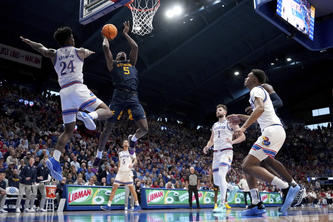 Plane trouble and injuries? West Virginia leans into 'No Excuses' mantra for 62-61 win at No. 7 KU | iNFOnews.ca Plane trouble and injuries? West Virginia leans into 'No Excuses' mantra for 62-61 win at No. 7 KU | iNFOnews.ca