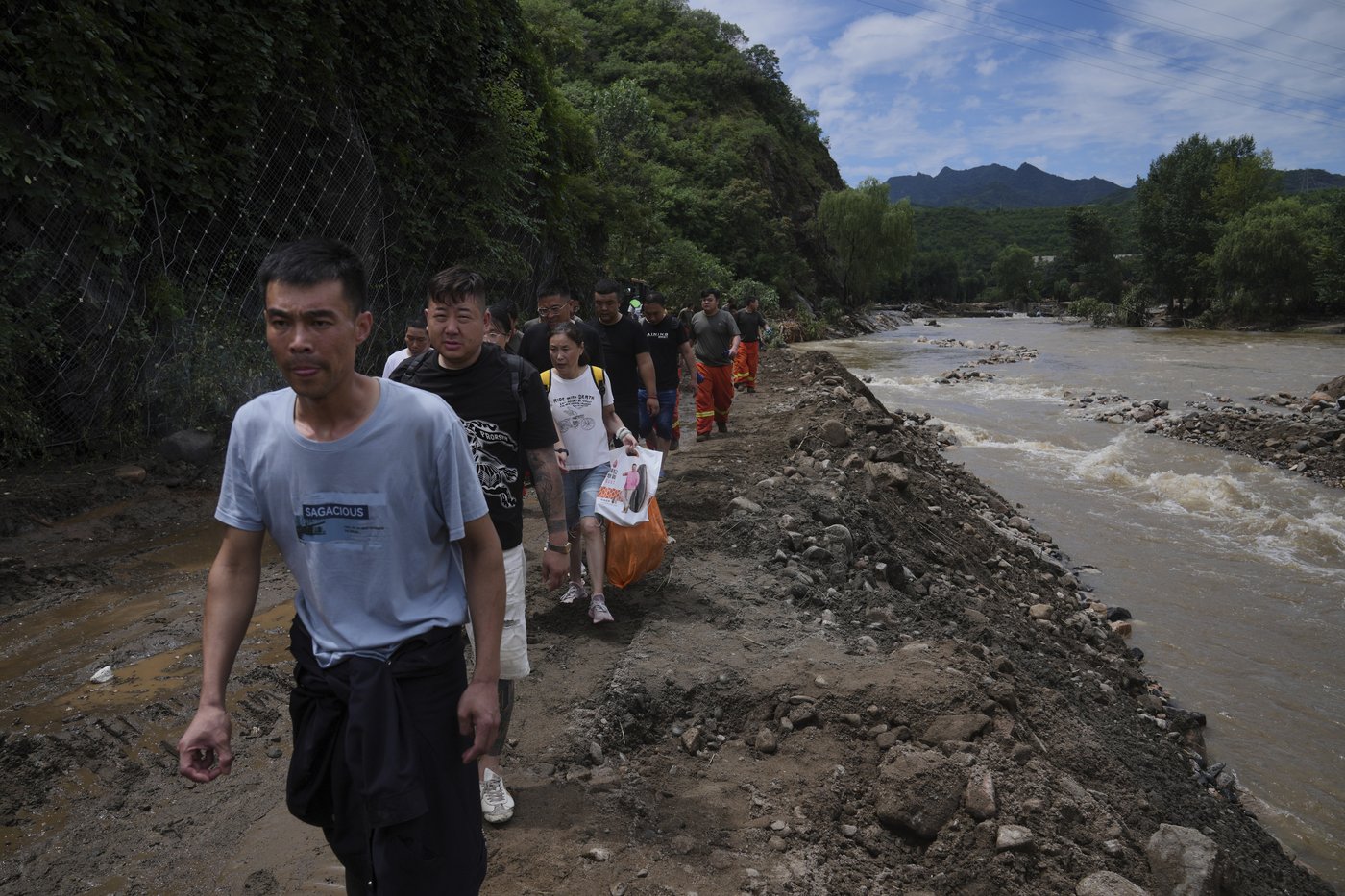 Heavy rain causes flooding, evacuations and at least 38 deaths around Beijing region | iNFOnews.ca