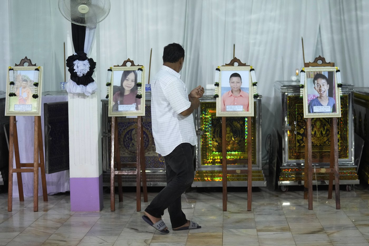 Memories and prayers are shared at a small-town funeral for the victims of horrific Thai bus fire | iNFOnews.ca Memories and prayers are shared at a small-town funeral for the victims of horrific Thai bus fire | iNFOnews.ca