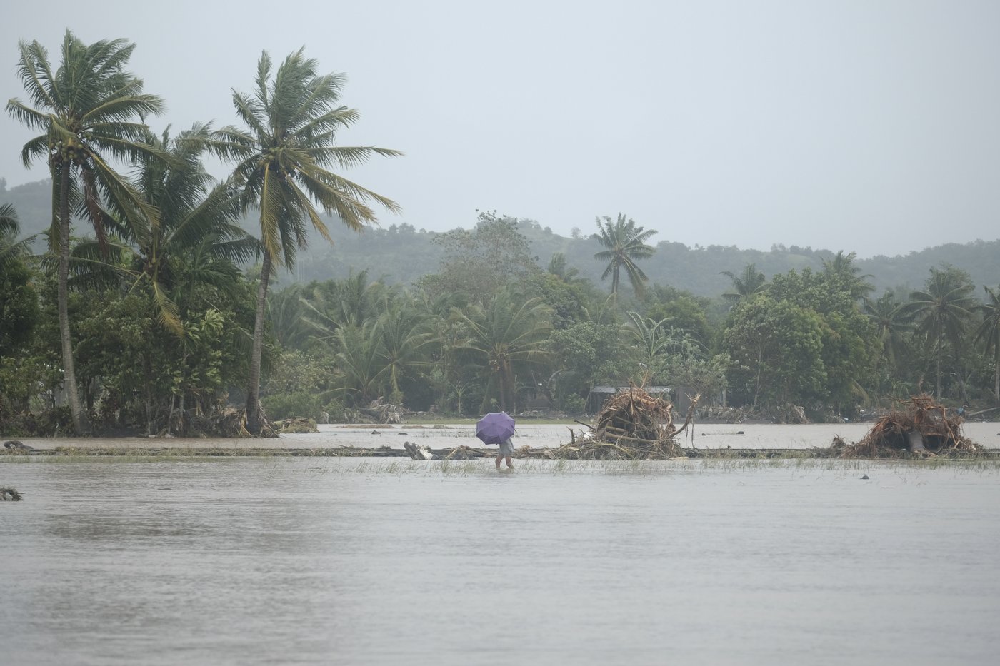 Tropical storm battering Philippines leaves at least 24 people dead in flooding and landslides | iNFOnews.ca Tropical storm battering Philippines leaves at least 24 people dead in flooding and landslides | iNFOnews.ca