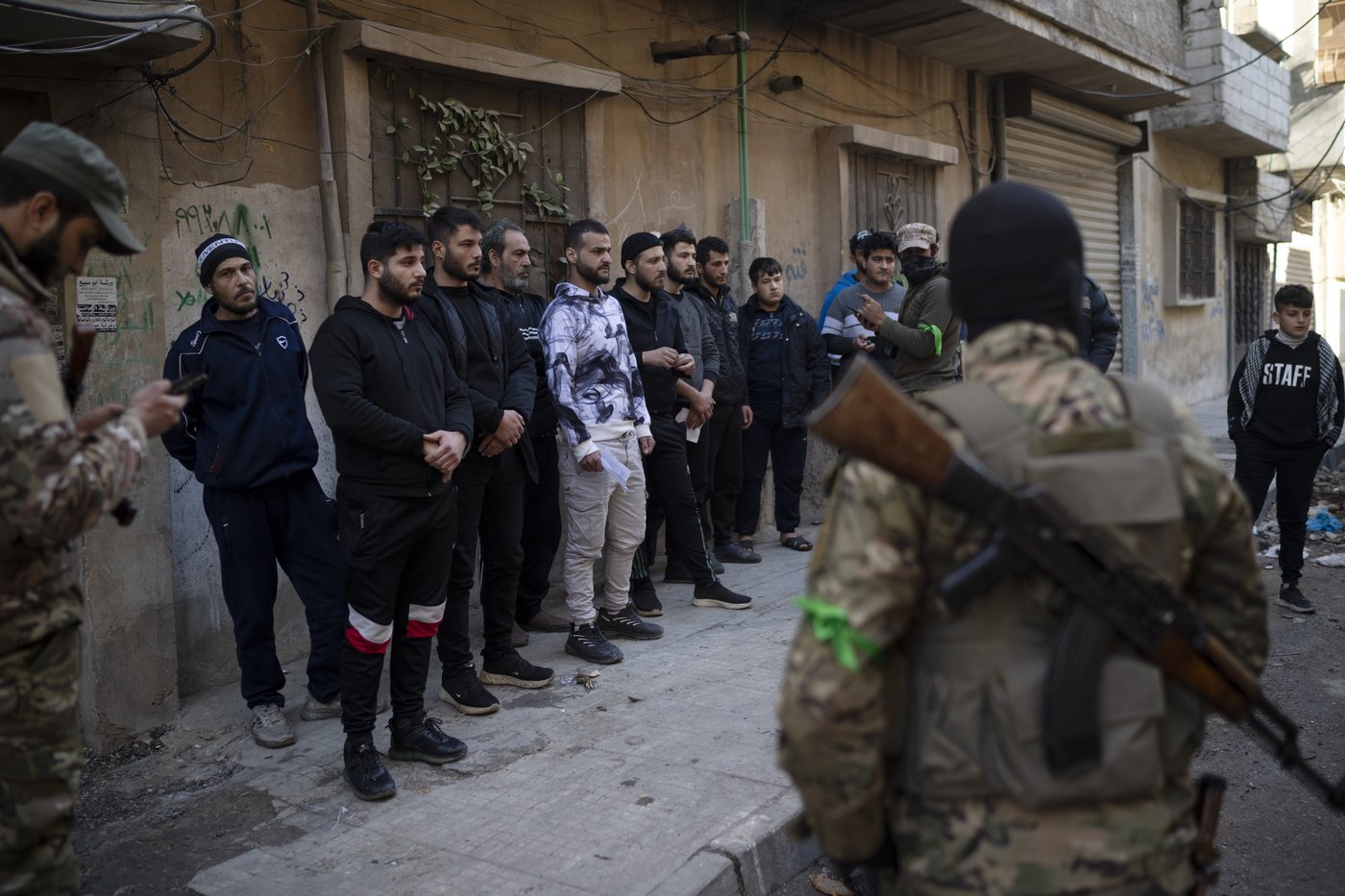 AP PHOTOS: Syria's new security forces conduct sweeps in Homs, looking for ousted Assad's loyalists | iNFOnews.ca