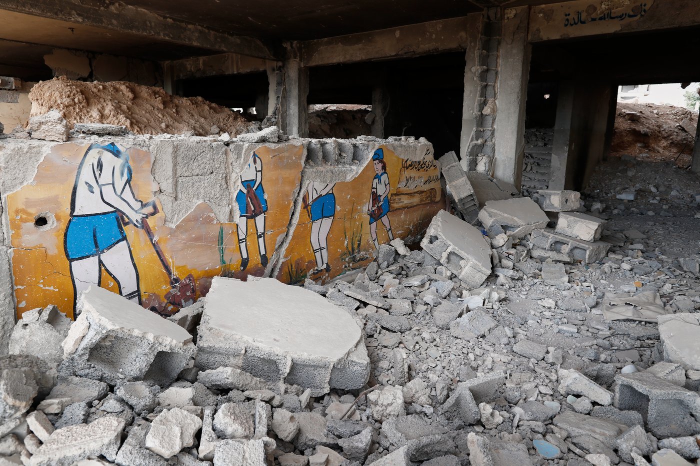 Photos show Syrian students returning to schools stripped bare by conflict | iNFOnews.ca