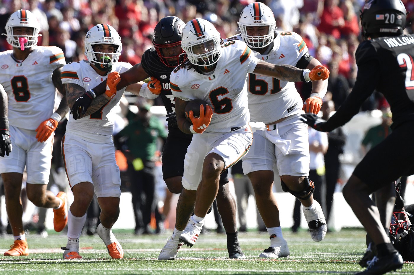 Cam Ward throws for 4 touchdowns, No. 6 Miami survives Louisville comeback bids for wild 52-45 win | iNFOnews.ca Cam Ward throws for 4 touchdowns, No. 6 Miami survives Louisville comeback bids for wild 52-45 win | iNFOnews.ca
