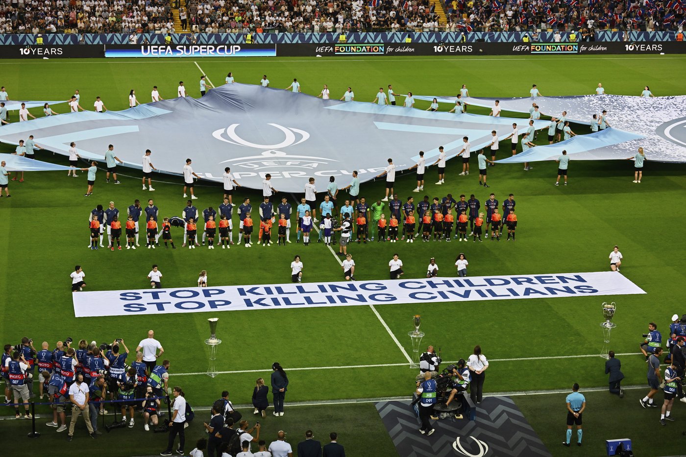 UEFA rolls out banner in support of children in war zones ahead of Super Cup | iNFOnews.ca