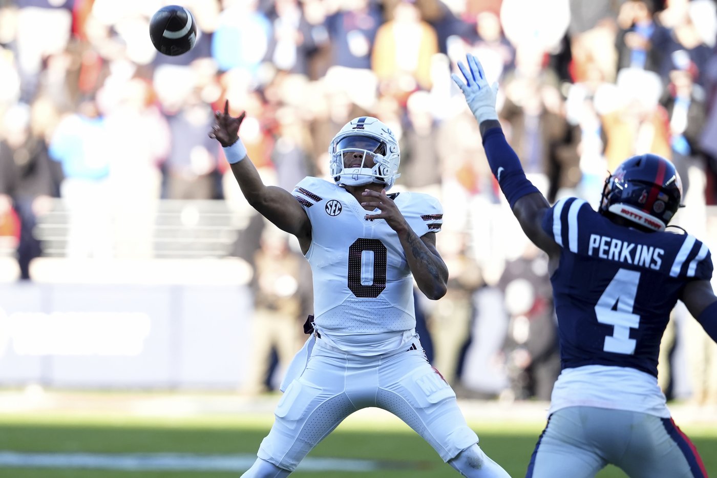No. 15 Ole Miss beats Mississippi St. 26-14 to win Egg Bowl and keep slim CFP hope alive | iNFOnews.ca No. 15 Ole Miss beats Mississippi St. 26-14 to win Egg Bowl and keep slim CFP hope alive | iNFOnews.ca