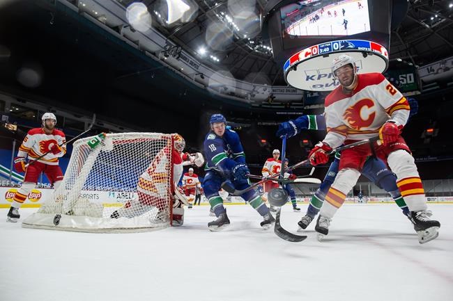 Canucks snap six-game losing skid with 3-1 victory over Calgary Flames | iNFOnews.ca Canucks snap six-game losing skid with 3-1 victory over Calgary Flames | iNFOnews.ca