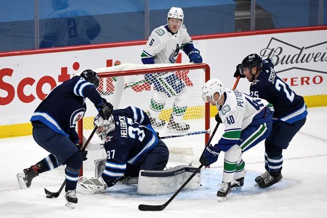 Three first-period goals pace Vancouver Canucks to 4-0 victory over Winnipeg Jets | iNFOnews.ca CP198200632