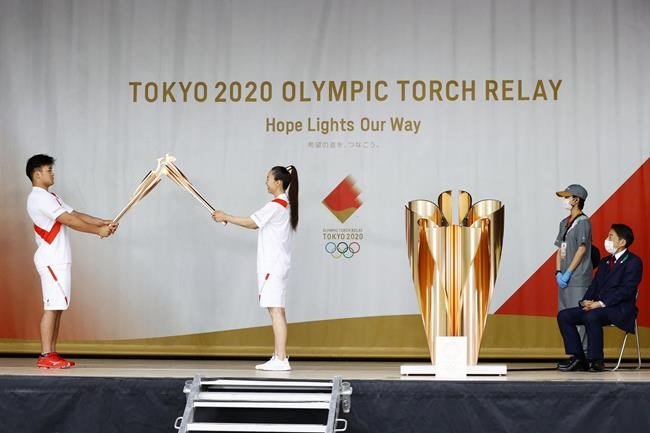 Tokyo Olympic torch relay pulled off streets in Hiroshima | iNFOnews.ca CP1971876779