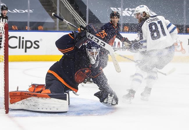 Jets' goaltender Connor Hellebuyck stellar in 4-1 win over Oilers in Game 1 | iNFOnews.ca
