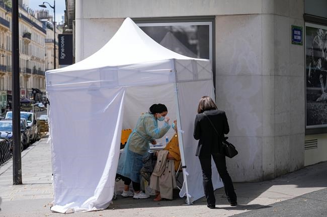 France's Macron orders all health workers to get vaccinated | iNFOnews.ca