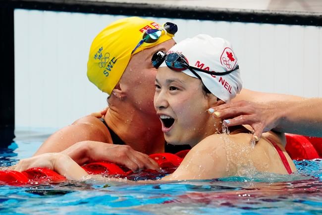 Mac Neil wins Canada's first gold in Tokyo Olympics, first in women's 100 butterfly | iNFOnews.ca Mac Neil wins Canada's first gold in Tokyo Olympics, first in women's 100 butterfly | iNFOnews.ca