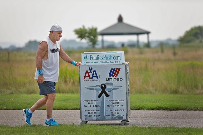 Man honors 9/11 crews with Boston-New York drink cart push | iNFOnews.ca CP633254766