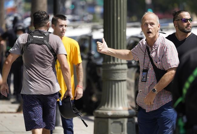 Man stabbed, reporter attacked at protest at LA City Hall | iNFOnews.ca