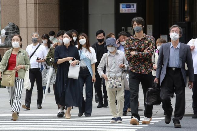Japan extends, expands coronavirus emergency as cases surge | iNFOnews.ca CP682566798