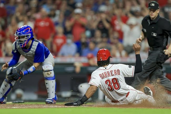 Votto gets 2,000th hit, Reds hand Cubs 12th straight loss | iNFOnews.ca