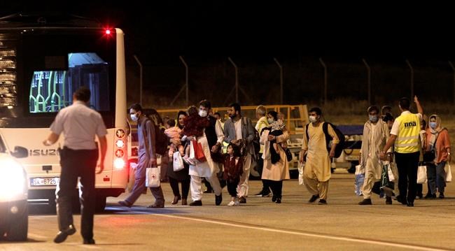 1st group of 149 Afghan evacuees arrives in North Macedonia | iNFOnews.ca