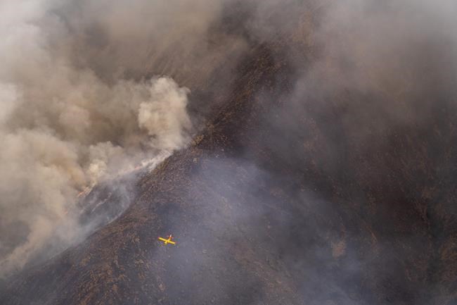 Rainfall helps firefighters control southern Spain's inferno | iNFOnews.ca Rainfall helps firefighters control southern Spain's inferno | iNFOnews.ca