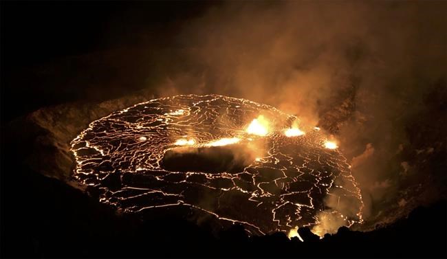 Erupting Hawaii volcano's alert level is lowered to 'watch' | iNFOnews.ca