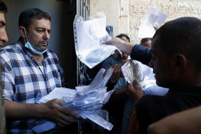 Israel announces 3,000 new work permits for Gazans | iNFOnews.ca CP1118876890