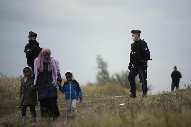 French police evacuate migrants from makeshift camp | iNFOnews.ca