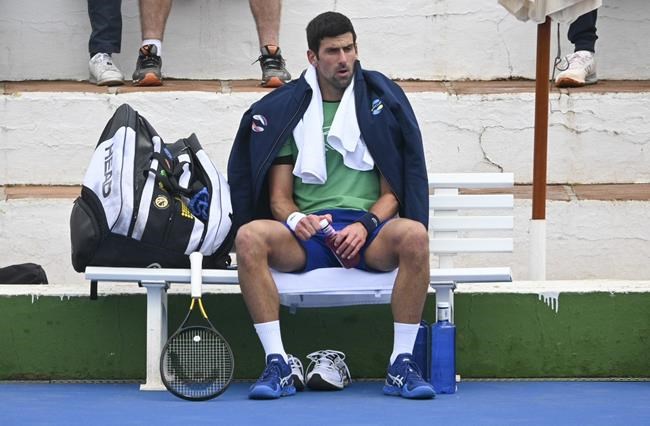 Djokovic back into swing in Australia, visa questions linger | iNFOnews.ca