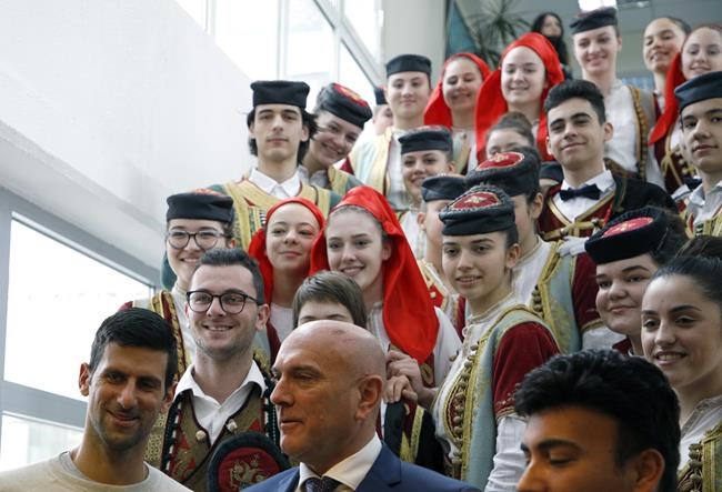 Djokovic feted in Montenegro amid new virus test doubts | iNFOnews.ca Djokovic feted in Montenegro amid new virus test doubts | iNFOnews.ca