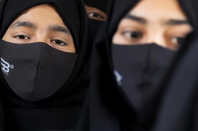 Indian scholars, activists criticize school hijab ban ruling | iNFOnews.ca