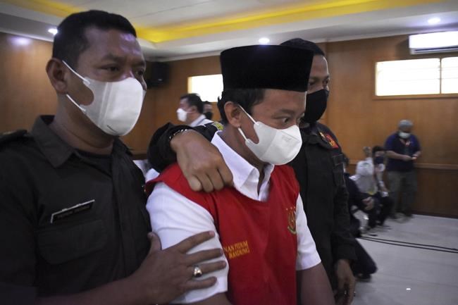 Indonesian principal sentenced to death for raping 13 girls | iNFOnews.ca CP1098544328