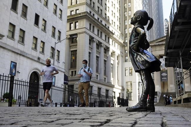 Fearless Girl statue will stay put opposite NYSE for now | iNFOnews.ca CP606359233