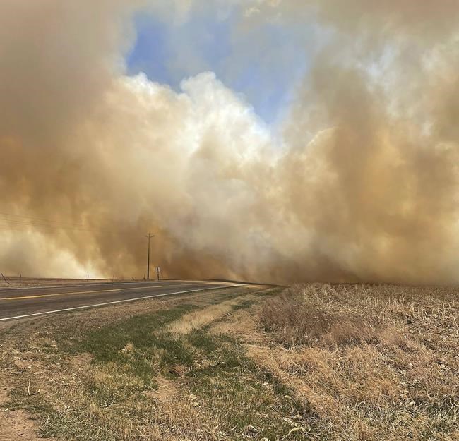 Wildfires tear across several states, driven by high winds | iNFOnews.ca