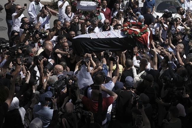 Palestinians mourn slain Al Jazeera journalist, blame Israel | iNFOnews.ca Palestinians mourn slain Al Jazeera journalist, blame Israel | iNFOnews.ca