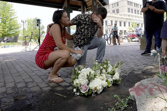 Parents of boy, 2, found alone at parade shooting among dead | iNFOnews.ca Parents of boy, 2, found alone at parade shooting among dead | iNFOnews.ca