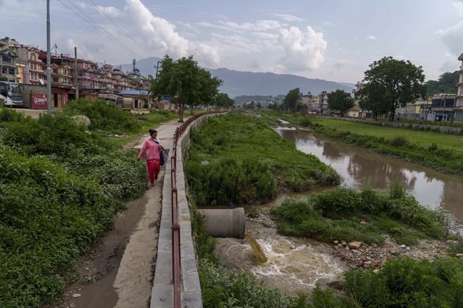 Nepal's holy Bagmati River choked with black sewage, trash | iNFOnews.ca CP1944310384