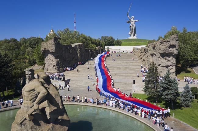 Putin lauds Russian national flag, self-determination | iNFOnews.ca