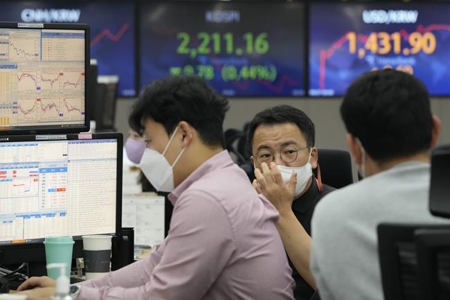 Asian shares mixed after Dow falls into bear market | iNFOnews.ca