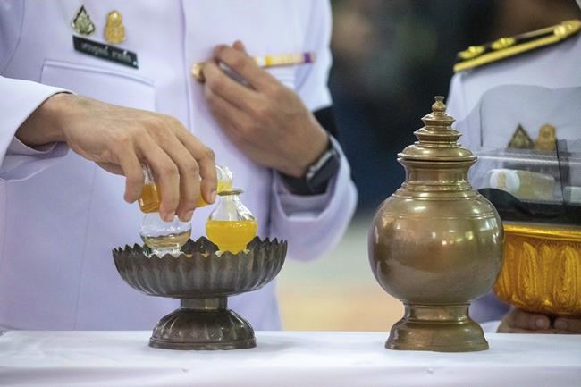 Mourners pray at Thai temple filled by children's keepsakes | iNFOnews.ca