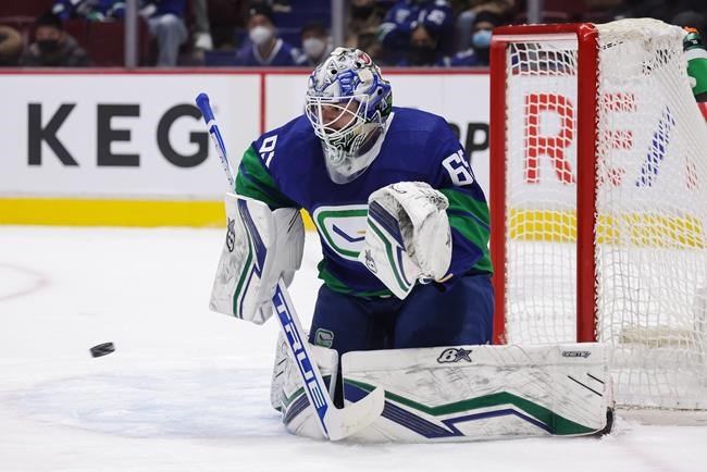 Canucks deal goalie DiPietro, prospect to Bruins for forward Studnicka | iNFOnews.ca