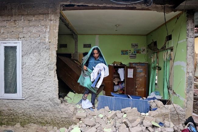 Indonesian rescuers search through rubble of quake; 268 dead | iNFOnews.ca Indonesian rescuers search through rubble of quake; 268 dead | iNFOnews.ca