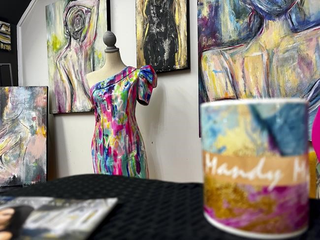 Artist’s hand-painted dress to match her work goes viral | iNFOnews.ca